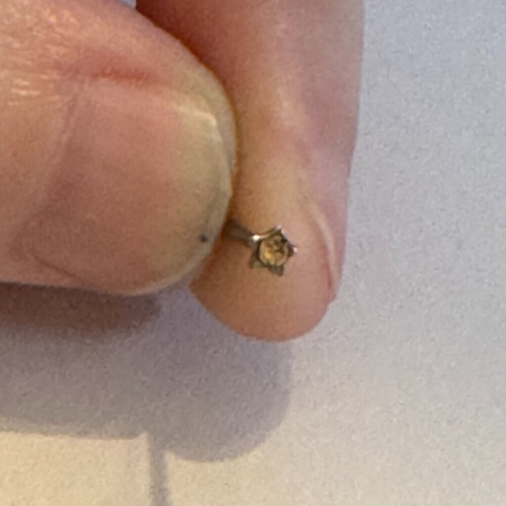 20 Gauge Topaz Yellow Star Shaped Nose Rings
